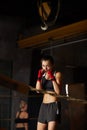 Tough Young Woman Boxing in Ring Royalty Free Stock Photo