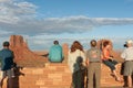 Touirists taking in the view in Monument Valley