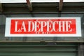 La depeche du midi shop sign text and logo brand on press shop news paper library store