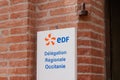 EDF logo brand and text sign on building entrance office of French multinational Royalty Free Stock Photo