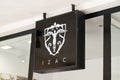 Izac sign text store and logo brand shop on facade boutique