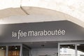 La fee maraboutee sign text store and logo brand shop on facade boutique retailer