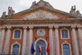 Toulouse facade capitole city hall in France with flag french latin text sign Royalty Free Stock Photo