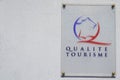 Qualite Tourisme logo sign label and brand text French hospitality and tourist services