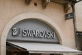 Swarovski logo swan brand and text store Austrian producer of jewelry luxury cut lead