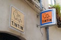 Tintin text brand and logo sign store of comic hero shop sell book comics toys and