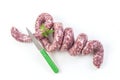 Toulouse sausage Raw `saucisse de toulouse` twisted f,rench meat specialty from Toulouse on white Royalty Free Stock Photo