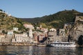 Tour boat approaching Vernazza, Cinque Terre, Italy Royalty Free Stock Photo