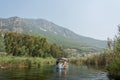 Tour boat on Azmak stream in Akyaka village in Mugla province of Turkey