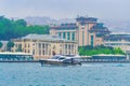 Tour boat on Bosphorus strait on rainy spring day Istanbul city Turkey Royalty Free Stock Photo