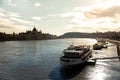 Tour boat on the Danube with silhouette of Parliament on the background. Budapest, Hungary Royalty Free Stock Photo