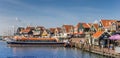 Tour boat in the historic harbor of Volendam