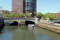 Tour boat with sightseers traveling along the River Walk,Providence,Rhode Island,2015
