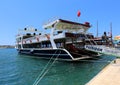 Tour Boat waiting for customers at Cesme Port Royalty Free Stock Photo