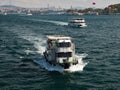 Tour boats cruising along Bosphotrus Strait in Istanbul, Turkey.