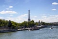 Tour boats are on Seine River in Paris.