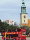 Tour bus parked in front of a church in Berlin, Germany