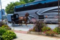 Tour Bus Passing Amish Buggy