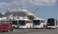 Tour buses await cruise ship passengers for a tour in Crete.