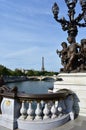 Tour Eiffel from Pont Alexandre III with bronze street light and handrail. Paris, France. Royalty Free Stock Photo