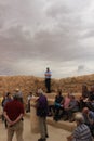 Tour group in the ancient synagogue of Masada in Israel