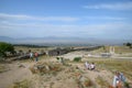 Tour groups on the ruins of Hierapolis. Tourists are shown the ruins of the ancient city