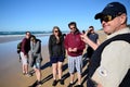 Tour guide on Fraser Island Australia holding a pipi shellfish Royalty Free Stock Photo