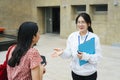 Tour guide giving direction to traveler