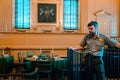 Tour guide showing tourist around Independence Hall in Philadelphia