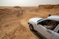 Tour Guide in an SUV in the Desert Royalty Free Stock Photo