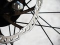 Touring bicycle disc brake at rear wheel in Close up. Royalty Free Stock Photo