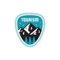 Tourism adventure outdoors - concept badge. Mountain climbing logo in flat style. Extreme exploration sticker symbol. Camping