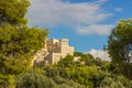 Tourism agency poster with top of green trees ancient antique temple and empty blue sky