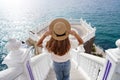 Tourism in Alicante, Spain. Back view of traveler girl descends stairs of Balcon del Mediterraneo in Benidorm, Alicante, Spain. Royalty Free Stock Photo