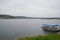 Tourism Boat on a marina pier of Alqueva Dam reservoir, in Portugal