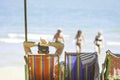 Tourism on canvas bed on the beach Background Blurry Tourism and sea at Suan Son Pradipat Beach , Prachuap Khiri Khan in Thailand