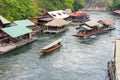 Tourism on the floating house rafting at the river Kwai