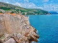 Tourism outside the stone wall of the Old Town in Dubrovnik, Croatia. Royalty Free Stock Photo