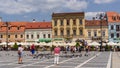 Tourism on Piata Sfatului at Brasov Royalty Free Stock Photo