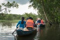 Tourism rowing boat in cajuput forest in floating water season in Mekong delta, Vietnam