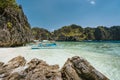 Tourism tour boat moored at the beach of Shimizu Island - El Nido, Palawan, Philippines Royalty Free Stock Photo