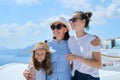 Tourism, travel, Greece, Santorini. Happy travelers mom and daughters