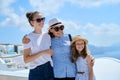 Tourism, travel, Greece, Santorini. Happy travelers mom and daughters