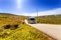 Camper car on road in orwegian mountains