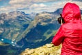 Tourist taking photo from Dalsnibba viewpoint Norway Royalty Free Stock Photo