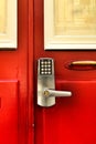 Tourist accommodation door with numeric key access Royalty Free Stock Photo