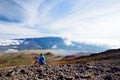 Tourist admiring breathtaking view of Mauna Loa volcano on the Big Island of Hawaii, USA Royalty Free Stock Photo