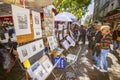 Tourist admiring painting at Montmartre, Paris Royalty Free Stock Photo