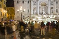 Tourist admiring the Trevi Fountain from Rome