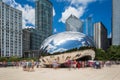 Tourist around the Cloud Gate `The Beam` at the Millennium Park in Chicago, Illinois